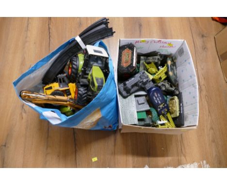 Two boxes of toys, tractor, digger, military toys, etc 
