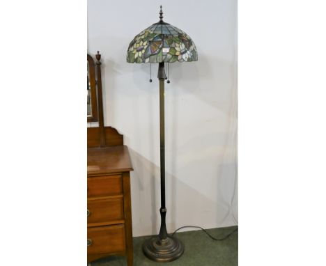 Tiffany style standard lamp with stain glass shade, height 168 cm, and tripod wine table 