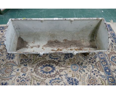 Cast iron animal feeding trough, height 29 cm, width 92 cm, depth +/- 28 cm