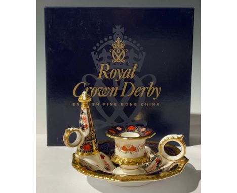 A Royal Crown Derby Imari palette 1128 pattern Winster chamber stick and snuffer, first quality, boxed 