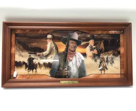 A pair of Bradex light up pictures one depicting Elvis Presley and the other John Wayne. Size approx 58.5x29cm