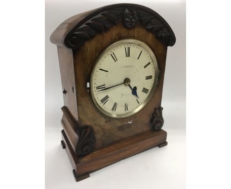 A mahogany single fusee mantle clock, approx height 31.5cm.