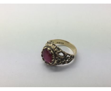 A 9ct gold ring set witha ruby, approx 5.2g and approx size O.