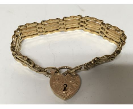 A 9carat Gold gate bracelet with a padlock clasp. Weight 20g approx.