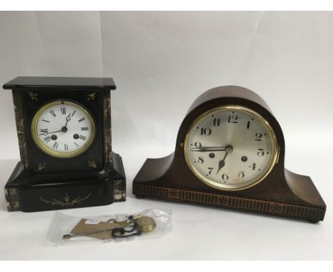 A Victorian slate mantle clock with enamel Roman Numeral dial plus an an oak example.