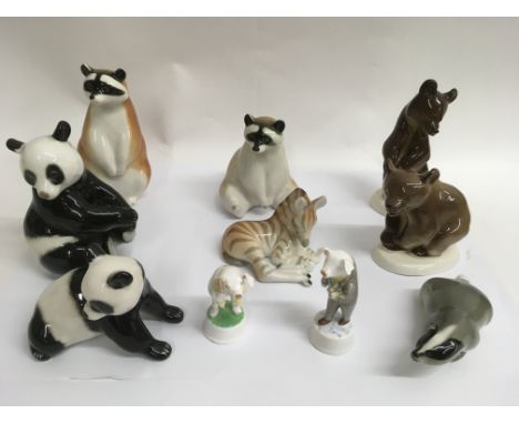 A collection of eight Lomonosov ceramic animals with two Bartley pigs