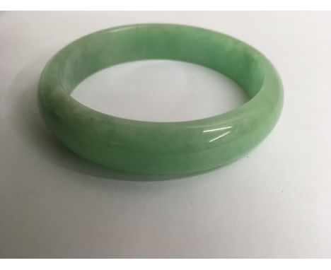 A green jade bangle