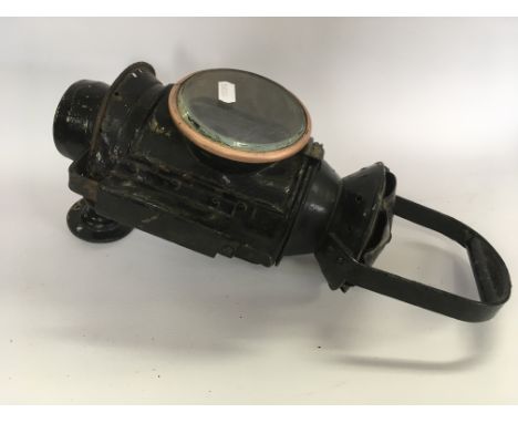 Wartime military railway lamp with bracket dated 1942 mark.