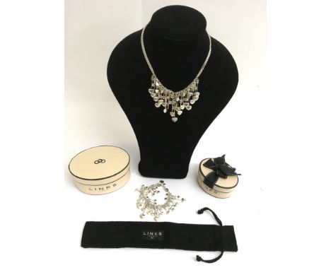 A boxed Links of London silver arrow drop necklace and matching bracelet