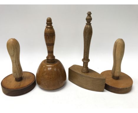 A collection of 4 upholstery tools.