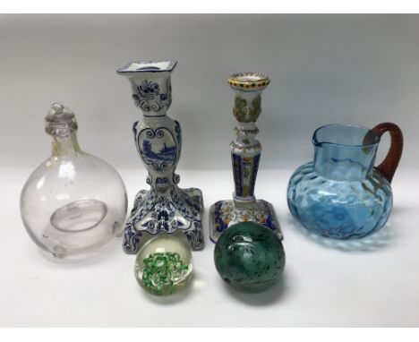 A pair of continental candlesticks (damaged and repaired), a glass flycatcher, 2 glass paperweights, a glass jug and 6 Women'
