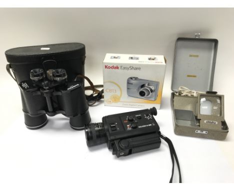 A collection including a digital camera and other photographic equipment including a tripod and pair of binoculars.