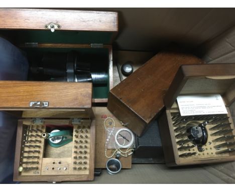 A collection of precision watch makers tools including Seiz, diamond microscopes etc