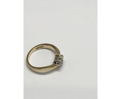 An 18ct gold and diamond set ring. Approx size K