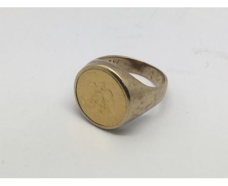 A gents 10k gold ring, approx size J-K and approx 4.9g.