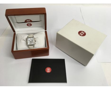 A boxed Michele diamond Chronograph wristwatch with square face and cabouchon stone set winder, complete with paperwork