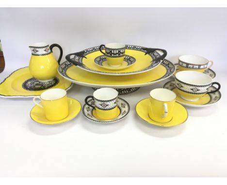 A collection of yellow and black and yellow and gold Royal Worcester ceramics to including coffee cups with saucers, a jug an