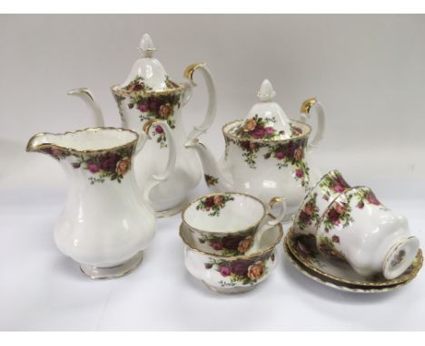 A part Royal Albert tea and coffee service in Old Country Roses pattern.