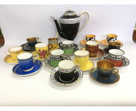 A collection of 15 Royal Worcester coffee cups and saucers of various design, including Art Deco and floral patterns, and a R