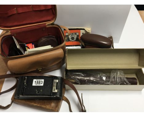 A Kodak Camera a Vintage folding camera and other oddments.