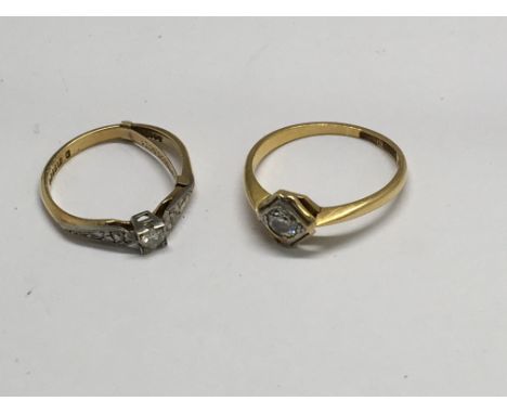Two gold rings set with diamonds. Approx N and K
