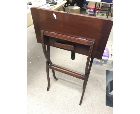 An Edwardian folding card table. Size approx when open 59x59.5x74cm