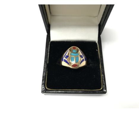 A modern design enamel set gold ring. Size approx R, weight approx 8g.