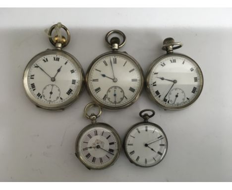 A collection of five silver pocket watches three button wind two pocket wind
