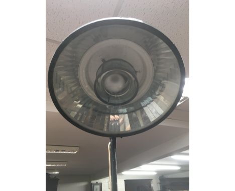 A green painted theatre lamp
