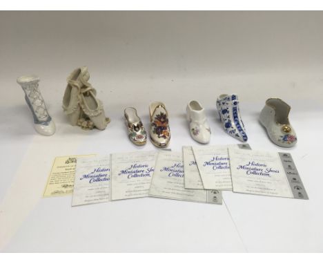 A collection of Porcelaine shoes with certificates to include Spode examples