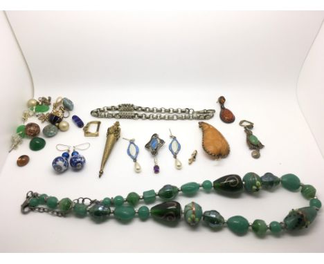 A small group of jewellery including Danish enamel brooch and earrings, and gold mounted drop