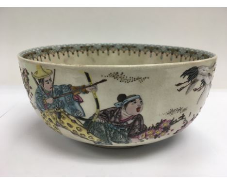 A handpainted Oriental bowl depicting figures hunting Storks to the exterior and figure with dogs to the inside, approx width
