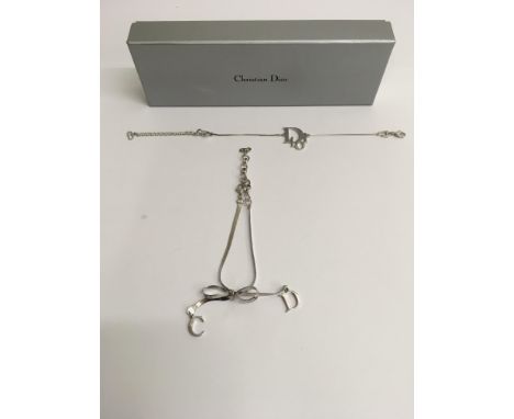 Two boxed Christian Dior designer bracelets
