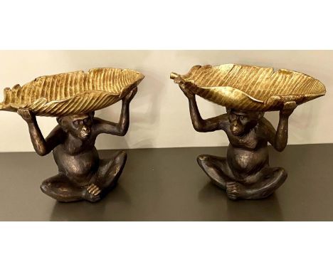 TRINKET DISHES, in the form of Monkeys holding Banana leaves aloft 33cm x 40cm x 18cm. 