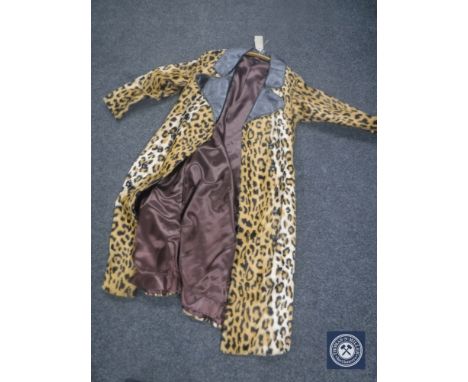 A vintage faux fur leopard print coat with leather collar
