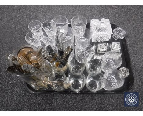A tray containing assorted glass ware including drinking glasses, etched glass jug, pair of inkwells, together with assorted 
