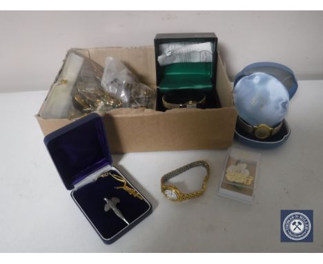 A box of enamelled badges, lady's Rotary wristwatch, Avia watch and one other etc 