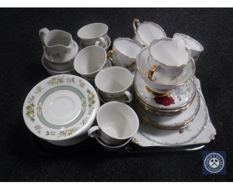 A tray of twenty-six pieces of Royal Doulton Tonkin tea service and twenty-one pieces of Royal Stafford bone china Roses to R