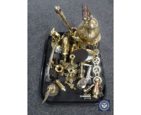 A tray of assorted brass ware, kettle on trivet, miniature cannons, figure of coal miner, pistol etc 