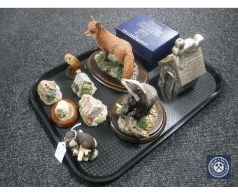 A tray of five Border Fine Arts and Country Artists animal figures, three Lilliput Cottages, child's money box and boxed Prec