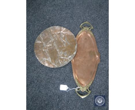 An Art Nouveau copper and brass tray and a circular copper plaque 