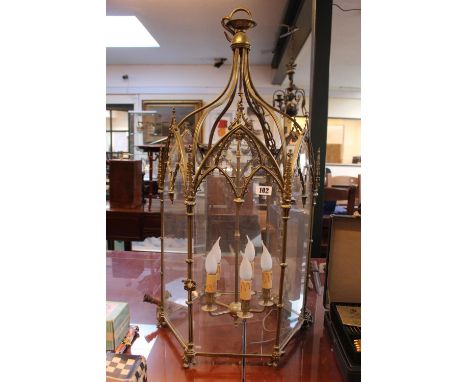 Gothic Revival Hexagonal Brass ceiling light of 5 branches with Arched brass glazed panels below three strand supports 100cm 