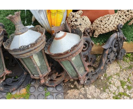 Pair of Cast Iron Lantern Outside light fittings with heavy Scroll mounts 