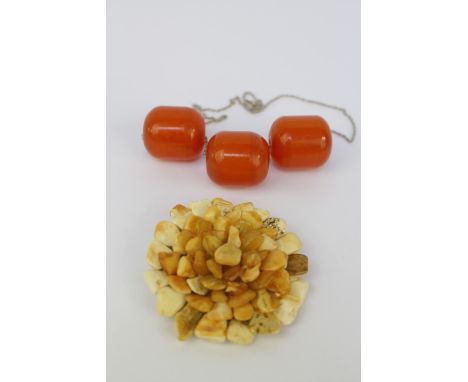 1970s Amber Floral brooch and 3 Amber Beads on White metal chain 