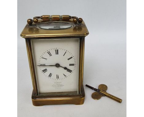 Good quality French Brass carriage clock with Roamn numeral dial and double ended key