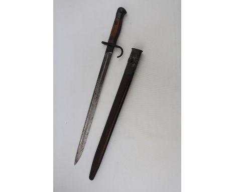 Rare First issue 1907 pattern bayonet with quillon and Mk 1 scabbard. Issue date of June 1908 to the blade and the same repea