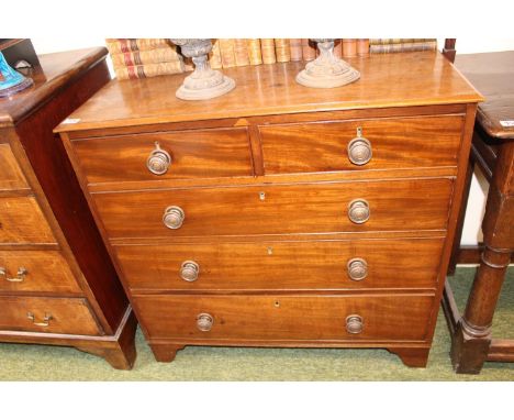 Georgian Chest of 2 over 3 drawers with Brass moulded handles over bracket feet. 93cm in Width 