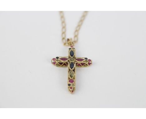 Ladies 9ct Gold Precious gemstone set cross with Ruby, Emerald and Peridot. On 9ct gold chain. 3.5g total weight