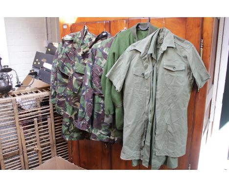 Three camouflage Army Jackets, NATO Fleece, various packs, shirts, braces etc 