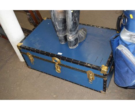 Navy blue and brass bound storage trunk